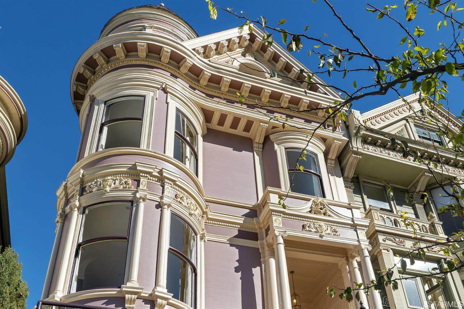 818 Steiner Street San Francisco, CA 94117 - Photo 3 of 74 Lower level is complete with a separate au pair or guest quarters that includes a bedroom/lounge and a full-bath which can be accessed separately though the home’s side entrance. Down the hall are a home gym & full-bathroom, a wine room, spacious laundry and utility areas, and a room with built-in storage that leads to the outdoor spa area with rain shower and cedar hot tub. There’s never been a better yard for entertaining; built-in seating, a roaring fire pit, and a concrete slide in its lower-level turf-lawn play space. This home offers a lifestyle surrounded by the beauty of Alamo Square Park, the vibrancy of Hayes Valley and Divisadero Corridor, and a clear connection to San Francisco’s downtown and beyond. 