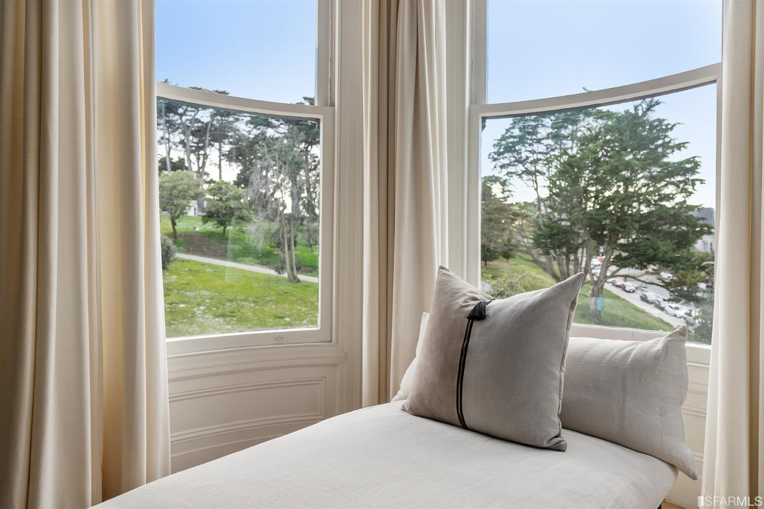 818 Steiner Street San Francisco, CA 94117 - Photo 23 of 74 Lower level is complete with a separate au pair or guest quarters that includes a bedroom/lounge and a full-bath which can be accessed separately though the home’s side entrance. Down the hall are a home gym & full-bathroom, a wine room, spacious laundry and utility areas, and a room with built-in storage that leads to the outdoor spa area with rain shower and cedar hot tub. There’s never been a better yard for entertaining; built-in seating, a roaring fire pit, and a concrete slide in its lower-level turf-lawn play space. This home offers a lifestyle surrounded by the beauty of Alamo Square Park, the vibrancy of Hayes Valley and Divisadero Corridor, and a clear connection to San Francisco’s downtown and beyond. 