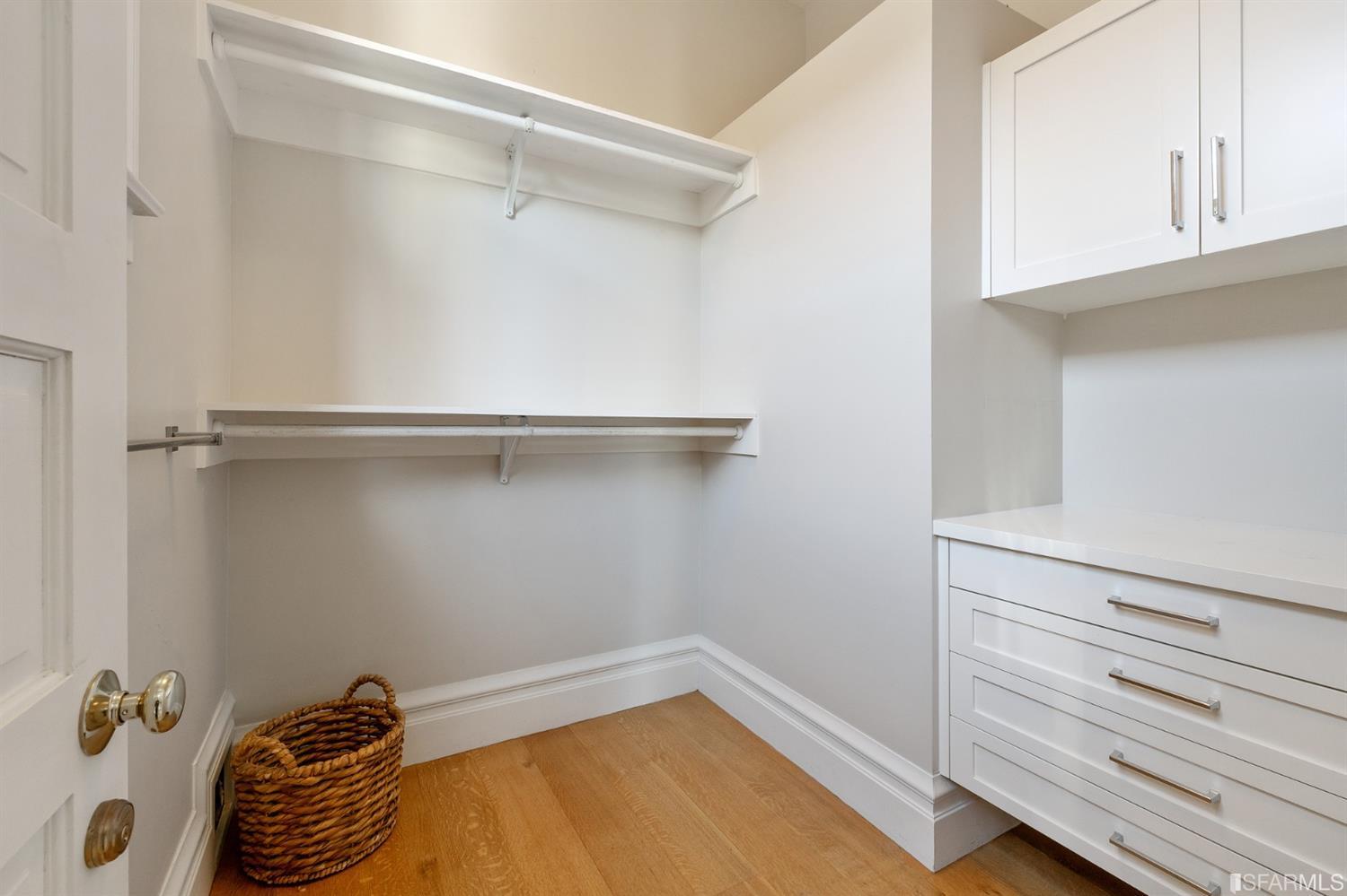 818 Steiner Street San Francisco, CA 94117 - Photo 27 of 74 Lower level is complete with a separate au pair or guest quarters that includes a bedroom/lounge and a full-bath which can be accessed separately though the home’s side entrance. Down the hall are a home gym & full-bathroom, a wine room, spacious laundry and utility areas, and a room with built-in storage that leads to the outdoor spa area with rain shower and cedar hot tub. There’s never been a better yard for entertaining; built-in seating, a roaring fire pit, and a concrete slide in its lower-level turf-lawn play space. This home offers a lifestyle surrounded by the beauty of Alamo Square Park, the vibrancy of Hayes Valley and Divisadero Corridor, and a clear connection to San Francisco’s downtown and beyond. 