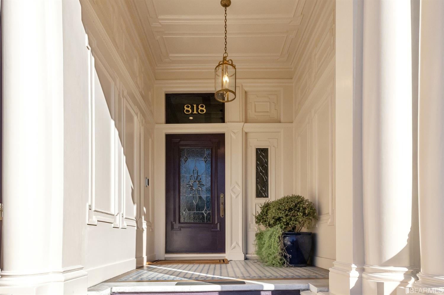 818 Steiner Street San Francisco, CA 94117 - Photo 4 of 74 Lower level is complete with a separate au pair or guest quarters that includes a bedroom/lounge and a full-bath which can be accessed separately though the home’s side entrance. Down the hall are a home gym & full-bathroom, a wine room, spacious laundry and utility areas, and a room with built-in storage that leads to the outdoor spa area with rain shower and cedar hot tub. There’s never been a better yard for entertaining; built-in seating, a roaring fire pit, and a concrete slide in its lower-level turf-lawn play space. This home offers a lifestyle surrounded by the beauty of Alamo Square Park, the vibrancy of Hayes Valley and Divisadero Corridor, and a clear connection to San Francisco’s downtown and beyond. 