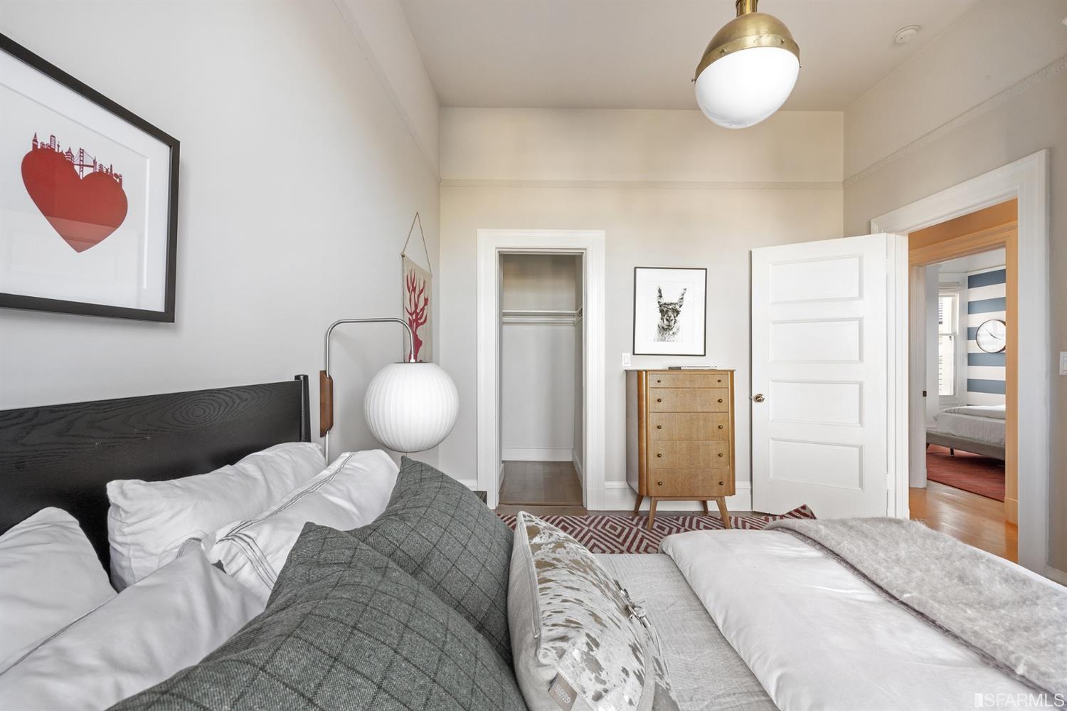 818 Steiner Street San Francisco, CA 94117 - Photo 31 of 74 Lower level is complete with a separate au pair or guest quarters that includes a bedroom/lounge and a full-bath which can be accessed separately though the home’s side entrance. Down the hall are a home gym & full-bathroom, a wine room, spacious laundry and utility areas, and a room with built-in storage that leads to the outdoor spa area with rain shower and cedar hot tub. There’s never been a better yard for entertaining; built-in seating, a roaring fire pit, and a concrete slide in its lower-level turf-lawn play space. This home offers a lifestyle surrounded by the beauty of Alamo Square Park, the vibrancy of Hayes Valley and Divisadero Corridor, and a clear connection to San Francisco’s downtown and beyond. 