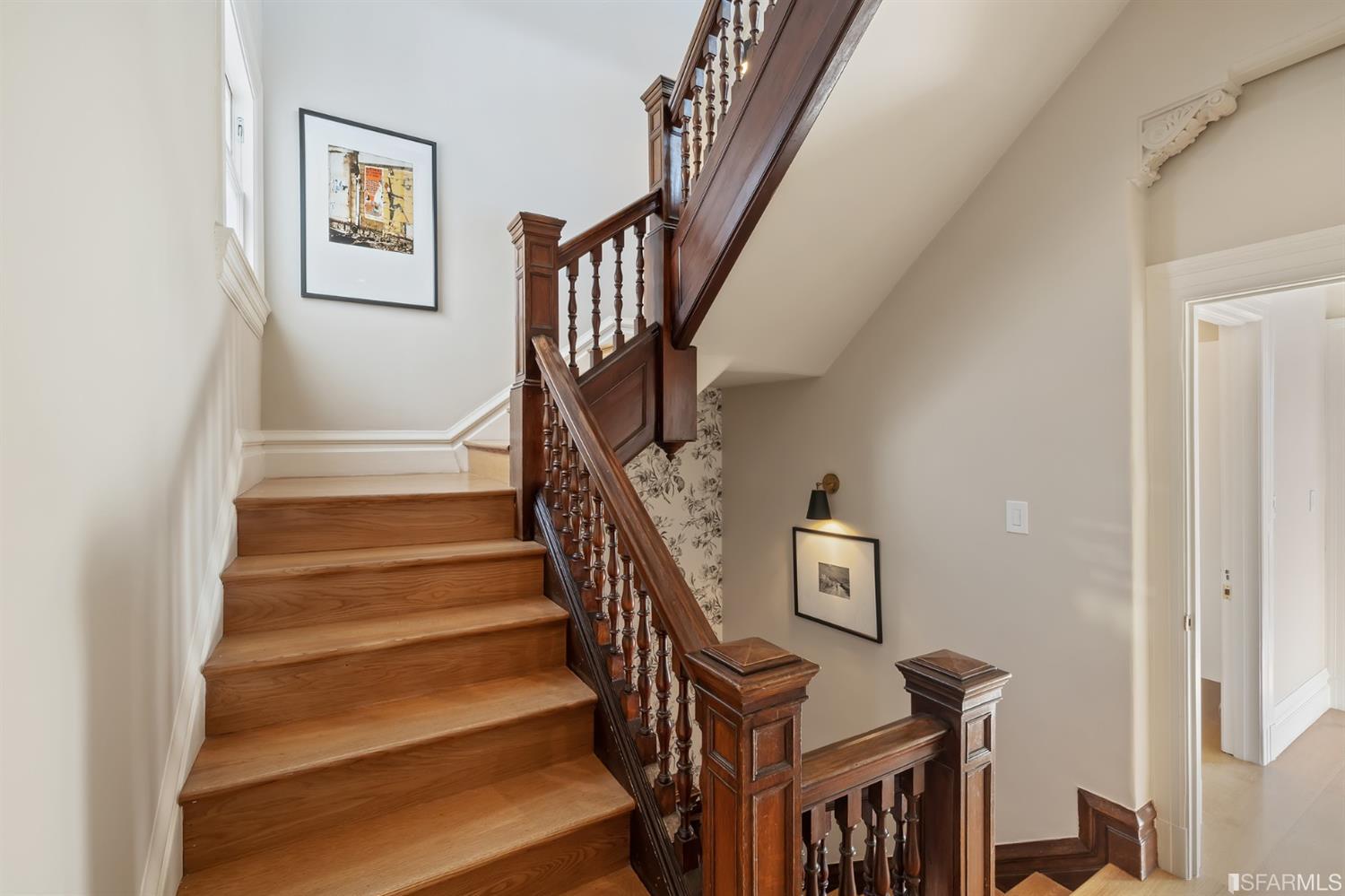 818 Steiner Street San Francisco, CA 94117 - Photo 34 of 74 Lower level is complete with a separate au pair or guest quarters that includes a bedroom/lounge and a full-bath which can be accessed separately though the home’s side entrance. Down the hall are a home gym & full-bathroom, a wine room, spacious laundry and utility areas, and a room with built-in storage that leads to the outdoor spa area with rain shower and cedar hot tub. There’s never been a better yard for entertaining; built-in seating, a roaring fire pit, and a concrete slide in its lower-level turf-lawn play space. This home offers a lifestyle surrounded by the beauty of Alamo Square Park, the vibrancy of Hayes Valley and Divisadero Corridor, and a clear connection to San Francisco’s downtown and beyond. 