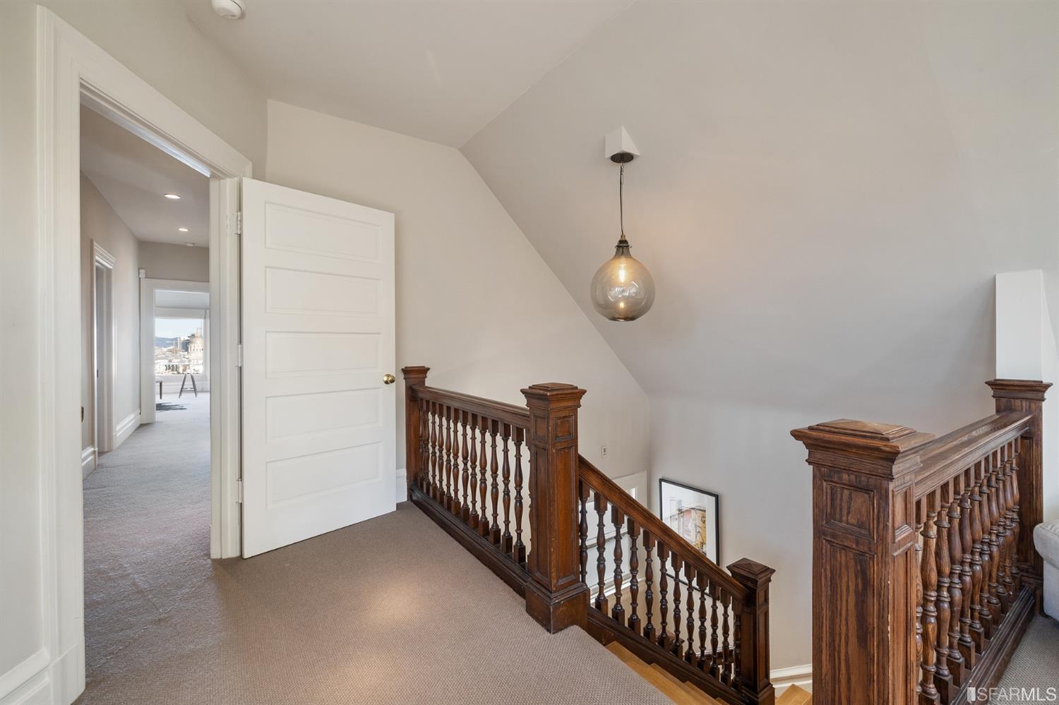 818 Steiner Street San Francisco, CA 94117 - Photo 41 of 74 Lower level is complete with a separate au pair or guest quarters that includes a bedroom/lounge and a full-bath which can be accessed separately though the home’s side entrance. Down the hall are a home gym & full-bathroom, a wine room, spacious laundry and utility areas, and a room with built-in storage that leads to the outdoor spa area with rain shower and cedar hot tub. There’s never been a better yard for entertaining; built-in seating, a roaring fire pit, and a concrete slide in its lower-level turf-lawn play space. This home offers a lifestyle surrounded by the beauty of Alamo Square Park, the vibrancy of Hayes Valley and Divisadero Corridor, and a clear connection to San Francisco’s downtown and beyond. 