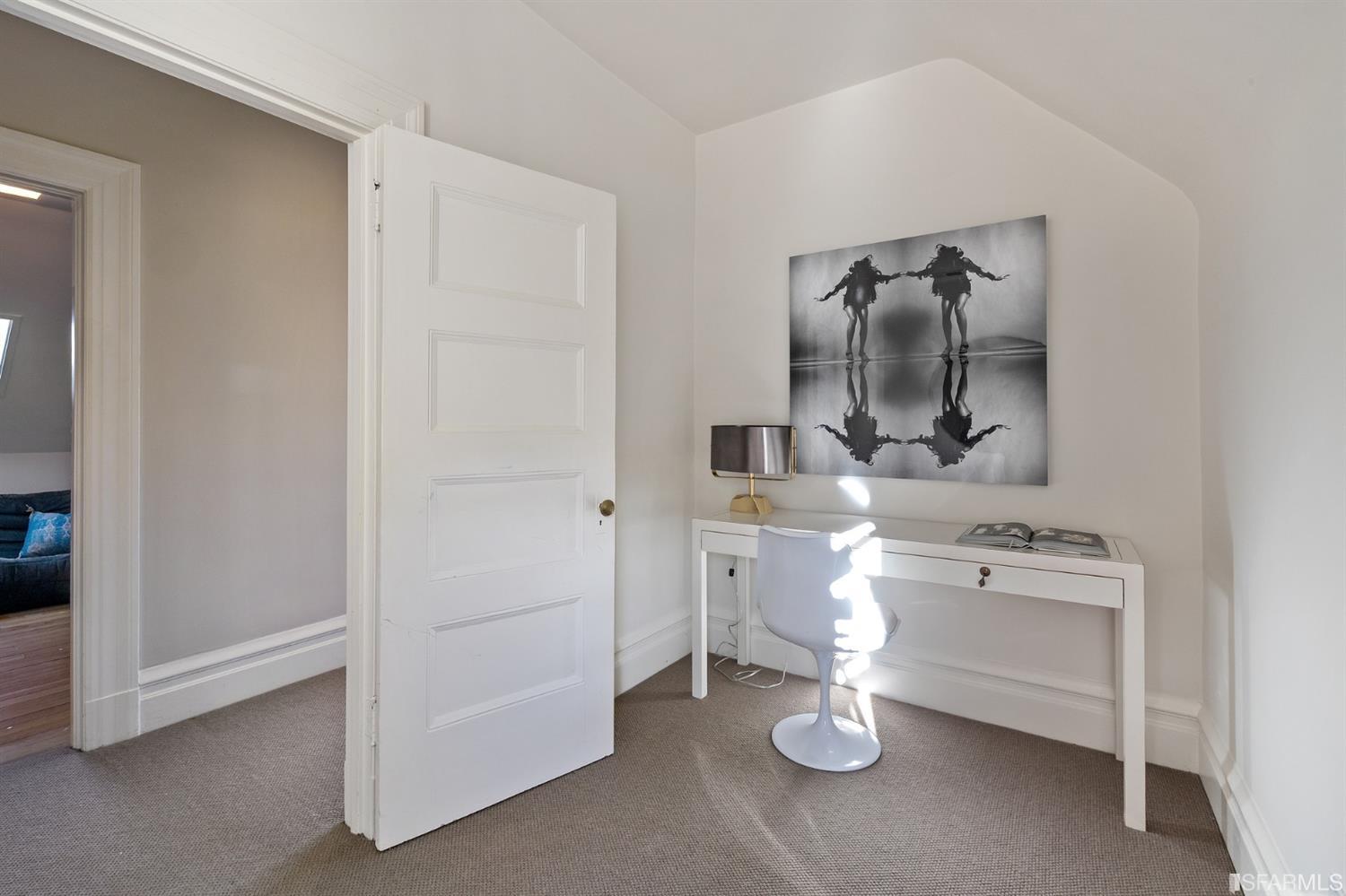 818 Steiner Street San Francisco, CA 94117 - Photo 44 of 74 Lower level is complete with a separate au pair or guest quarters that includes a bedroom/lounge and a full-bath which can be accessed separately though the home’s side entrance. Down the hall are a home gym & full-bathroom, a wine room, spacious laundry and utility areas, and a room with built-in storage that leads to the outdoor spa area with rain shower and cedar hot tub. There’s never been a better yard for entertaining; built-in seating, a roaring fire pit, and a concrete slide in its lower-level turf-lawn play space. This home offers a lifestyle surrounded by the beauty of Alamo Square Park, the vibrancy of Hayes Valley and Divisadero Corridor, and a clear connection to San Francisco’s downtown and beyond. 