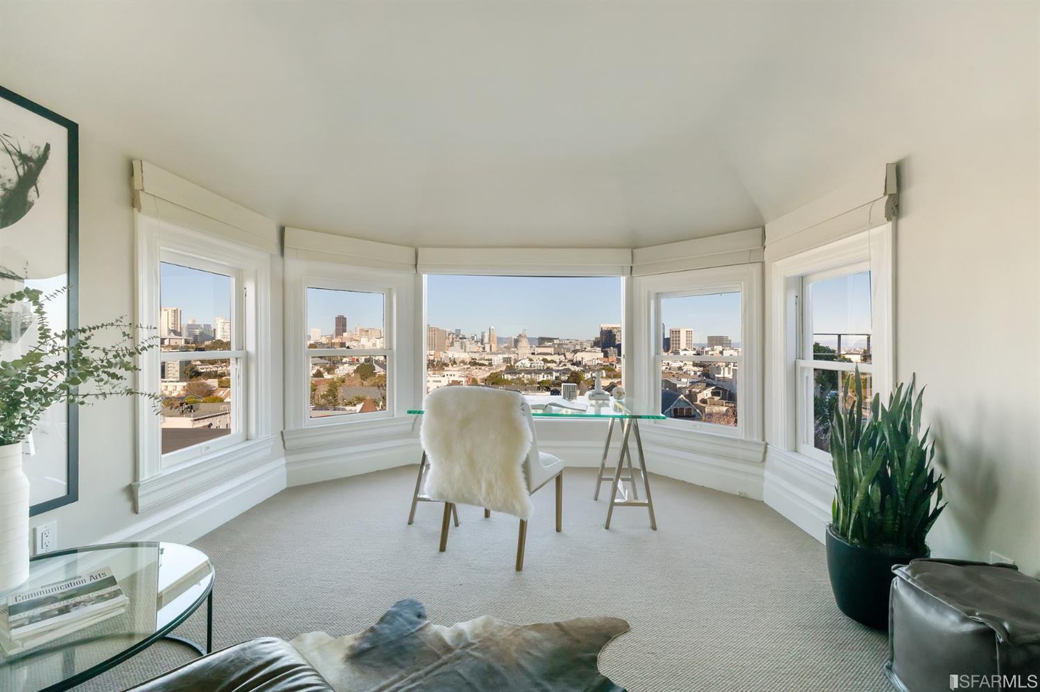 818 Steiner Street San Francisco, CA 94117 - Photo 45 of 74 Lower level is complete with a separate au pair or guest quarters that includes a bedroom/lounge and a full-bath which can be accessed separately though the home’s side entrance. Down the hall are a home gym & full-bathroom, a wine room, spacious laundry and utility areas, and a room with built-in storage that leads to the outdoor spa area with rain shower and cedar hot tub. There’s never been a better yard for entertaining; built-in seating, a roaring fire pit, and a concrete slide in its lower-level turf-lawn play space. This home offers a lifestyle surrounded by the beauty of Alamo Square Park, the vibrancy of Hayes Valley and Divisadero Corridor, and a clear connection to San Francisco’s downtown and beyond. 