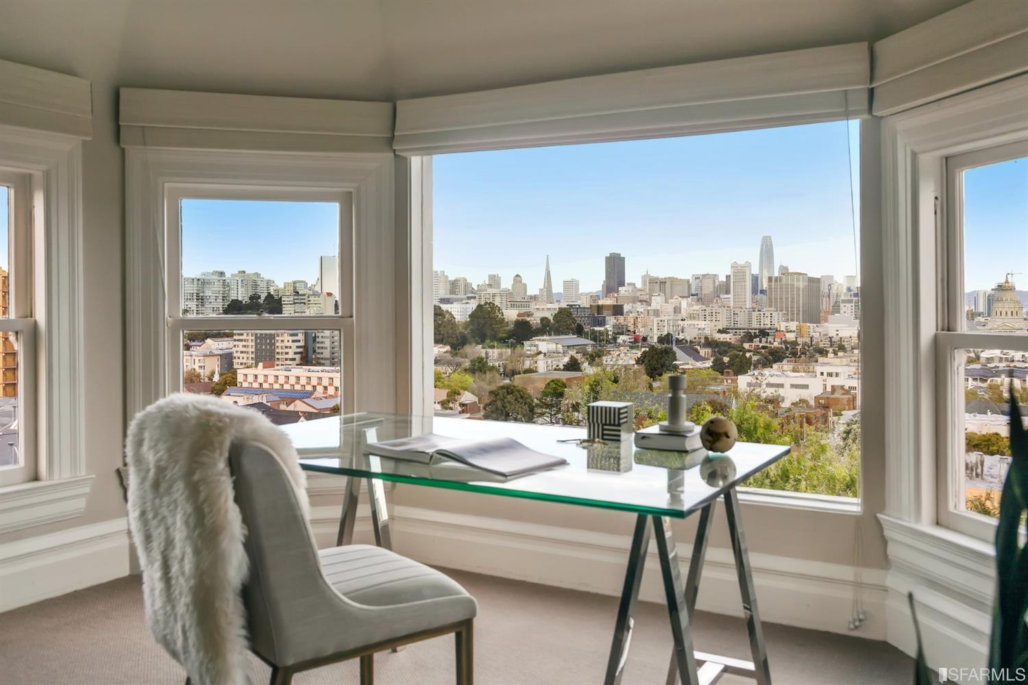 818 Steiner Street San Francisco, CA 94117 - Photo 48 of 74 Lower level is complete with a separate au pair or guest quarters that includes a bedroom/lounge and a full-bath which can be accessed separately though the home’s side entrance. Down the hall are a home gym & full-bathroom, a wine room, spacious laundry and utility areas, and a room with built-in storage that leads to the outdoor spa area with rain shower and cedar hot tub. There’s never been a better yard for entertaining; built-in seating, a roaring fire pit, and a concrete slide in its lower-level turf-lawn play space. This home offers a lifestyle surrounded by the beauty of Alamo Square Park, the vibrancy of Hayes Valley and Divisadero Corridor, and a clear connection to San Francisco’s downtown and beyond. 