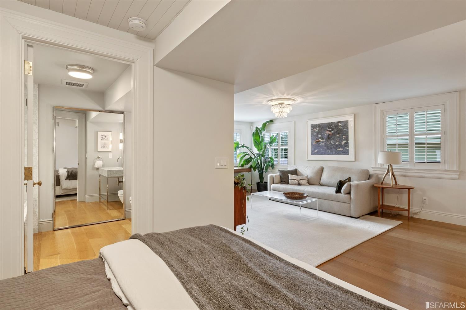 818 Steiner Street San Francisco, CA 94117 - Photo 52 of 74 Lower level is complete with a separate au pair or guest quarters that includes a bedroom/lounge and a full-bath which can be accessed separately though the home’s side entrance. Down the hall are a home gym & full-bathroom, a wine room, spacious laundry and utility areas, and a room with built-in storage that leads to the outdoor spa area with rain shower and cedar hot tub. There’s never been a better yard for entertaining; built-in seating, a roaring fire pit, and a concrete slide in its lower-level turf-lawn play space. This home offers a lifestyle surrounded by the beauty of Alamo Square Park, the vibrancy of Hayes Valley and Divisadero Corridor, and a clear connection to San Francisco’s downtown and beyond. 