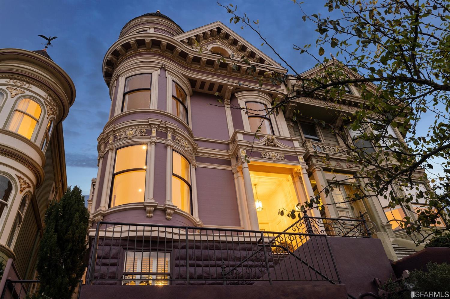 818 Steiner Street San Francisco, CA 94117 - Photo 61 of 74 Lower level is complete with a separate au pair or guest quarters that includes a bedroom/lounge and a full-bath which can be accessed separately though the home's side entrance. Down the hall are a home gym & full-bathroom, a wine room, spacious laundry and utility areas, and a room with built-in storage that leads to the outdoor spa area with rain shower and cedar hot tub. There's never been a better yard for entertaining; built-in seating, a roaring fire pit, and a concrete slide in its lower-level turf-lawn play space. This home offers a lifestyle surrounded by the beauty of Alamo Square Park, the vibrancy of Hayes Valley and Divisadero Corridor, and a clear connection to San Francisco's downtown and beyond.