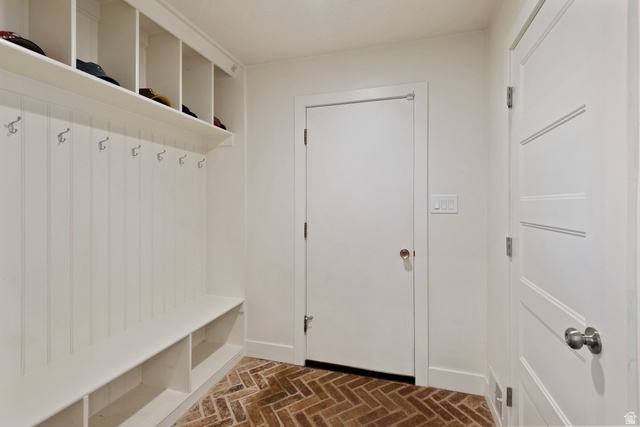 1900 North 100 East Provo, UT 84604 - Photo 22 of 49 Built-in white storage bench with cubbies, upper shelving, and coat hooks