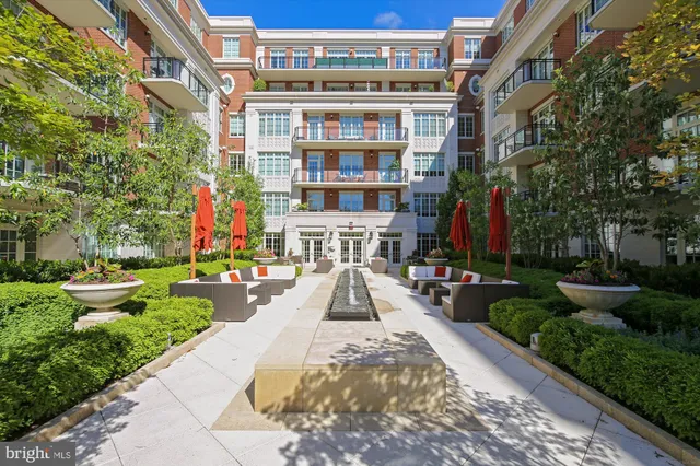 a view of multiple houses with yard