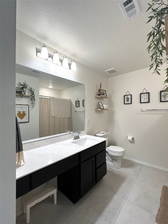 14313 James Buchanan Street Manor, TX 78653 - Photo 15 of 19 a bathroom with a sink a toilet and mirror