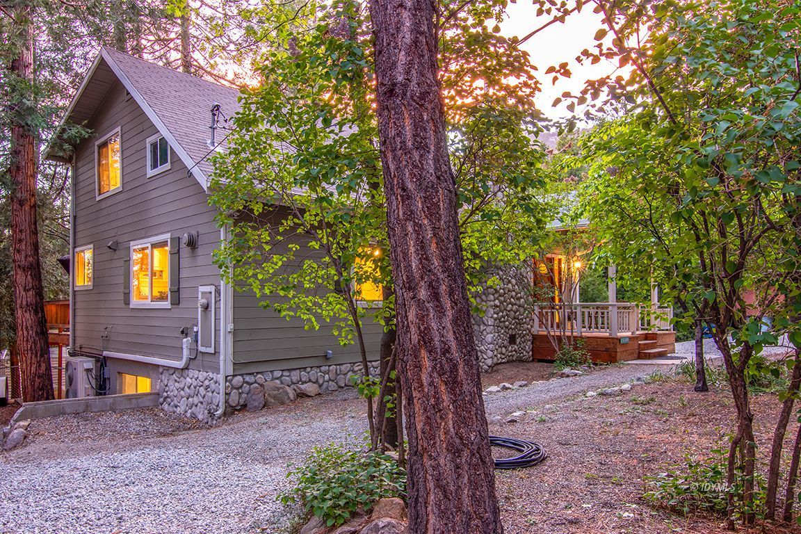 25341 Tahquitz Road Idyllwild, CA 92549 - Photo 3 of 56 a backyard of a house with lots of green space