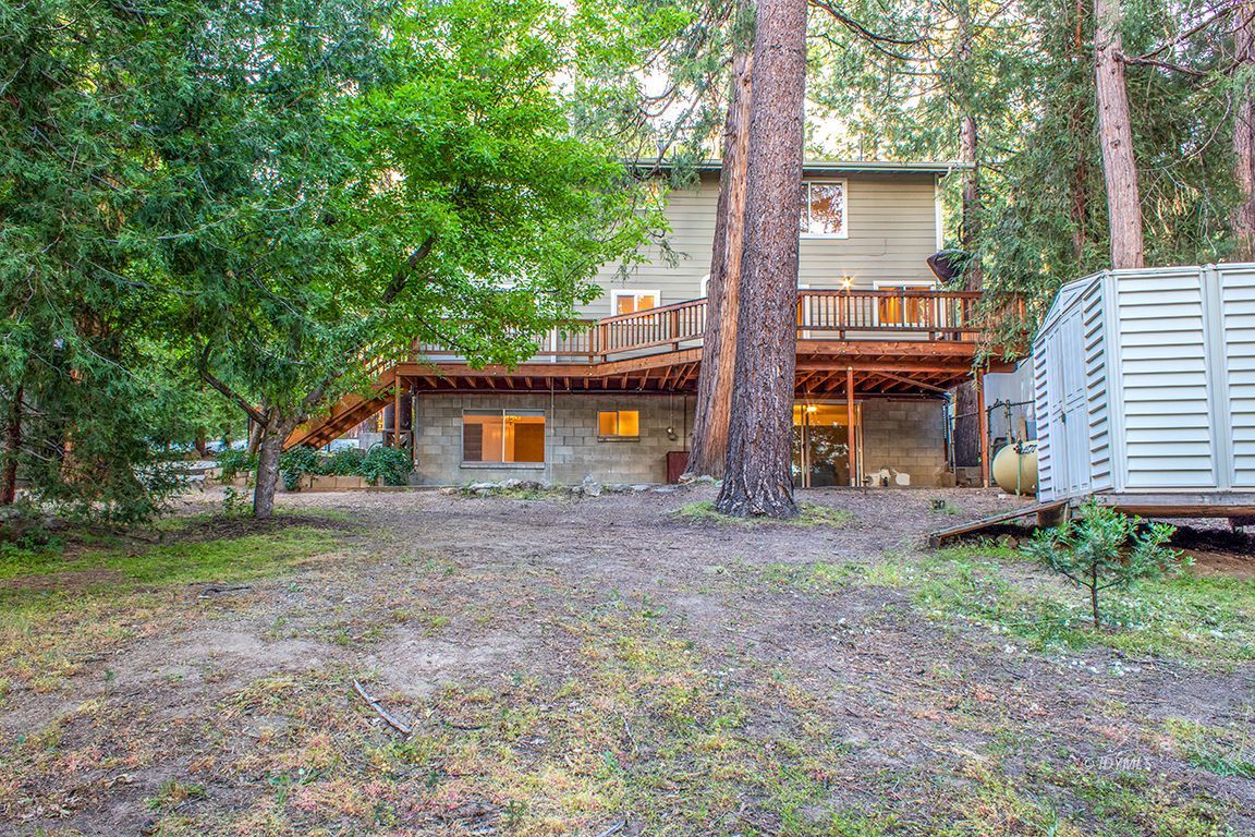 25341 Tahquitz Road Idyllwild, CA 92549 - Photo 26 of 56 a front view of a house with a yard