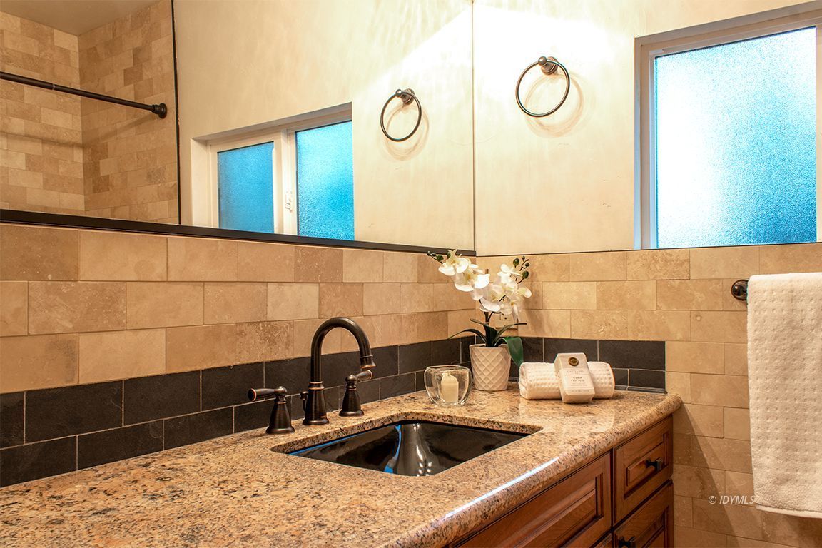 25341 Tahquitz Road Idyllwild, CA 92549 - Photo 29 of 56 a bathroom with a sink and a mirror