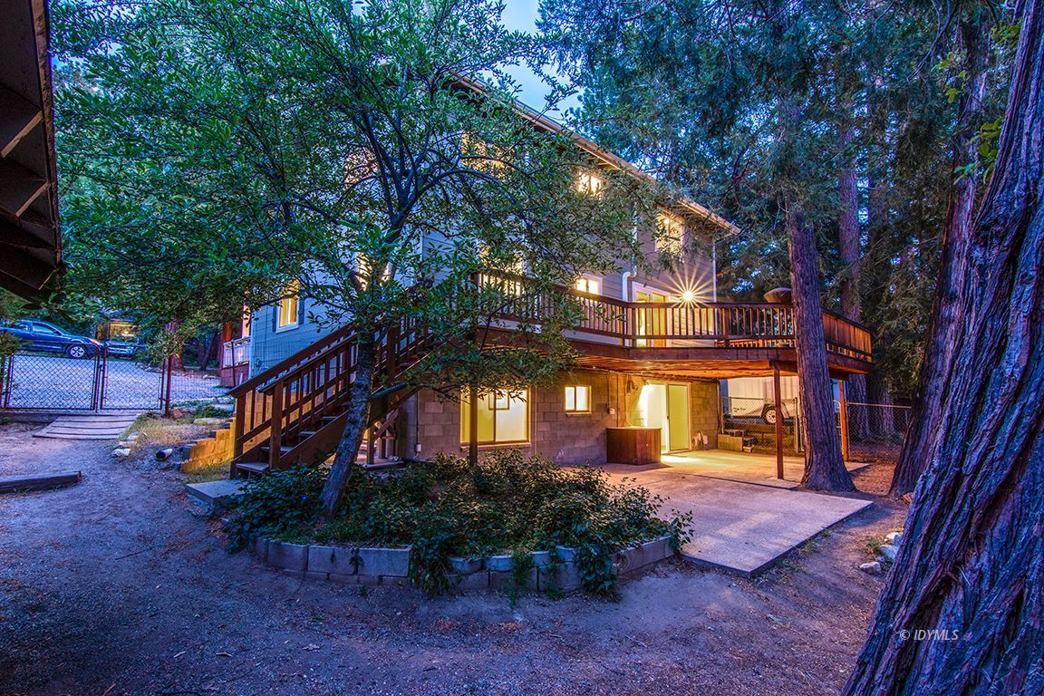 25341 Tahquitz Road Idyllwild, CA 92549 - Photo 5 of 56 a front view of a house with a yard