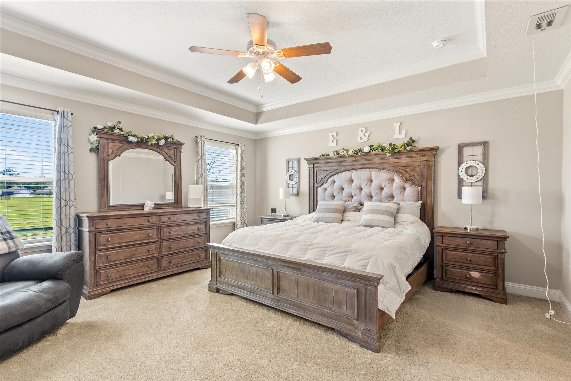 23 Alagon Way Street St. Augustine, FL 32084 - Photo 13 of 51 a bedroom with a bed and ceiling fan