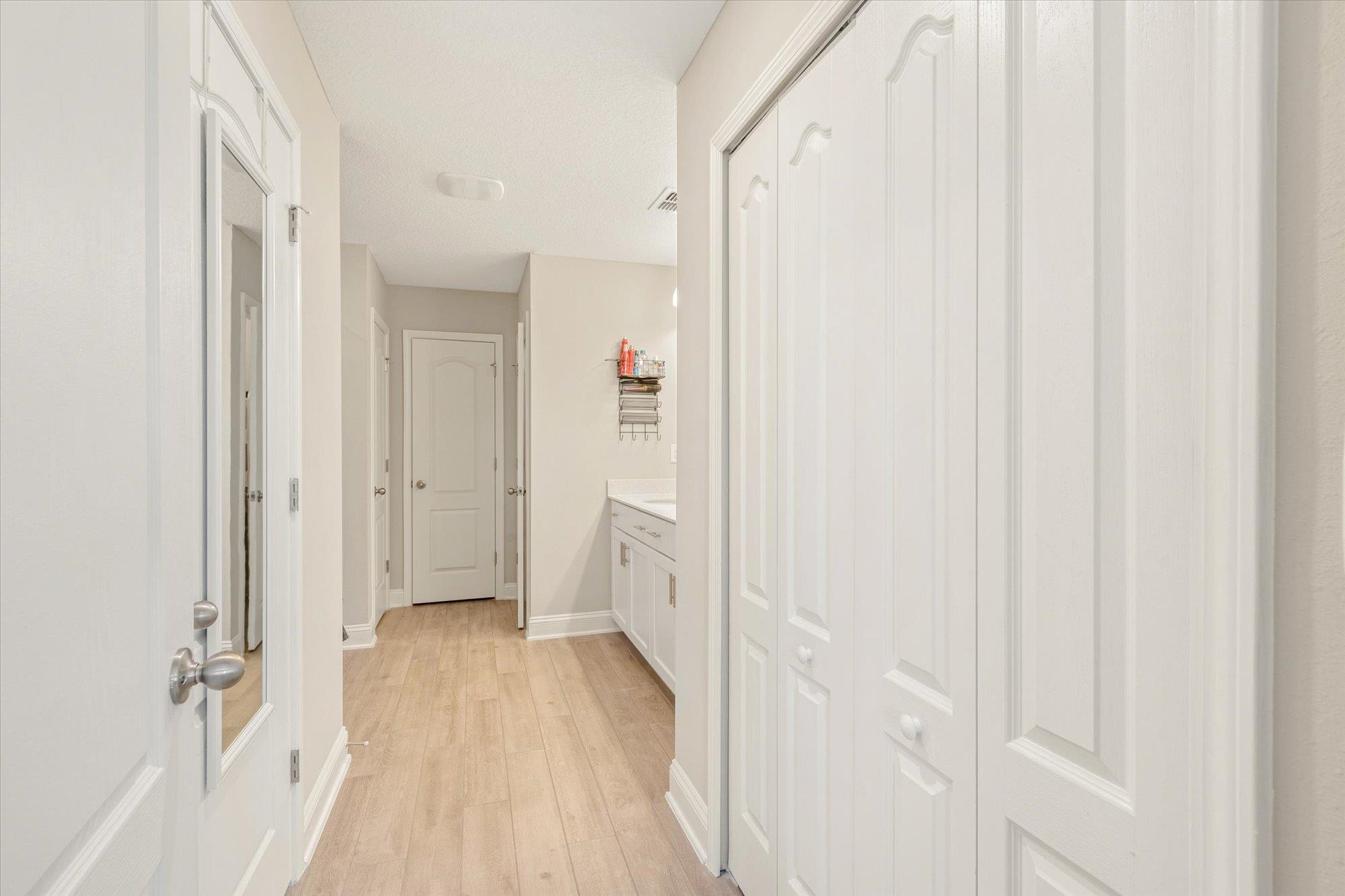 23 Alagon Way Street St. Augustine, FL 32084 - Photo 16 of 51 a view of a bathroom with a sink and a mirror