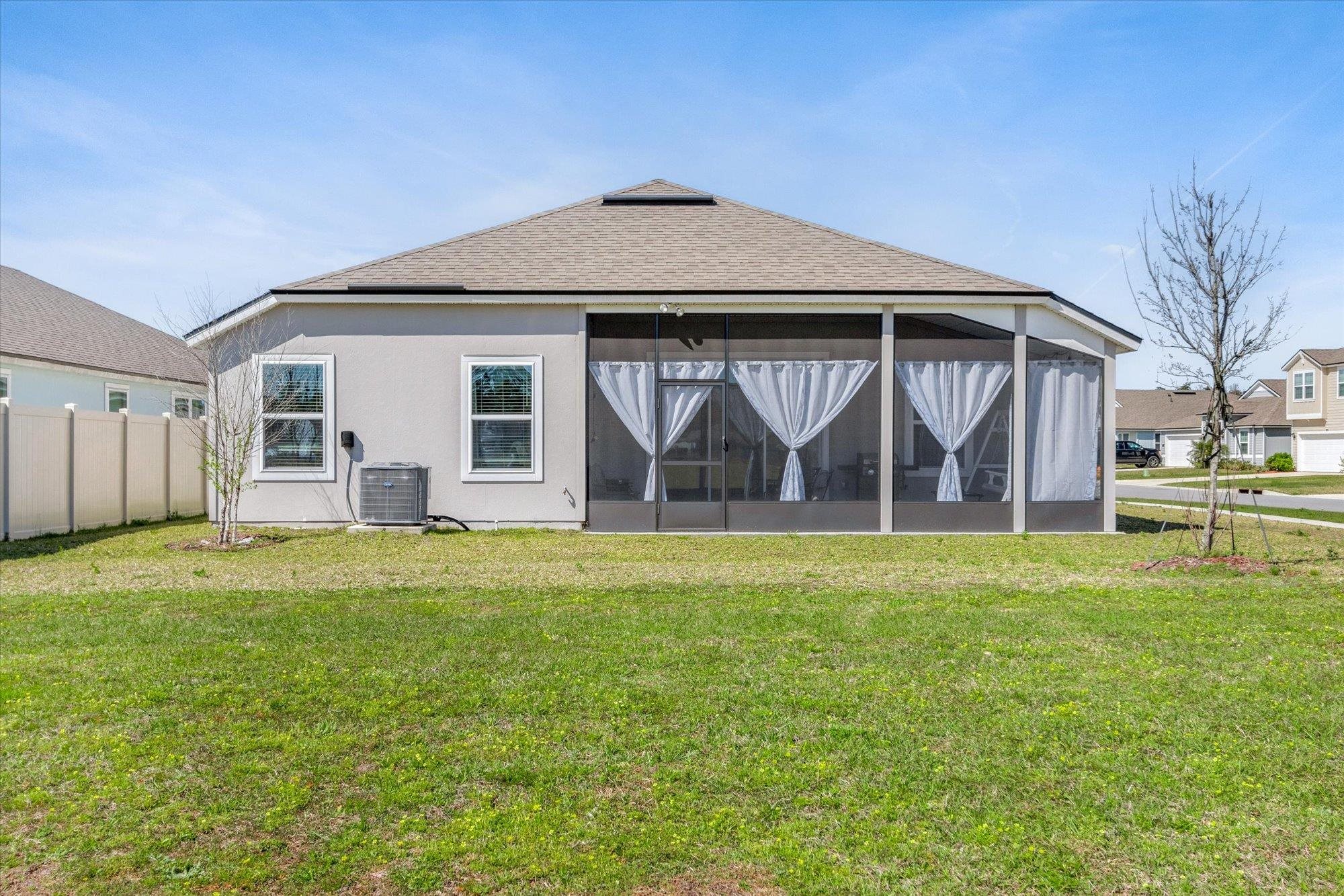 23 Alagon Way Street St. Augustine, FL 32084 - Photo 28 of 51 a front view of a house with garden