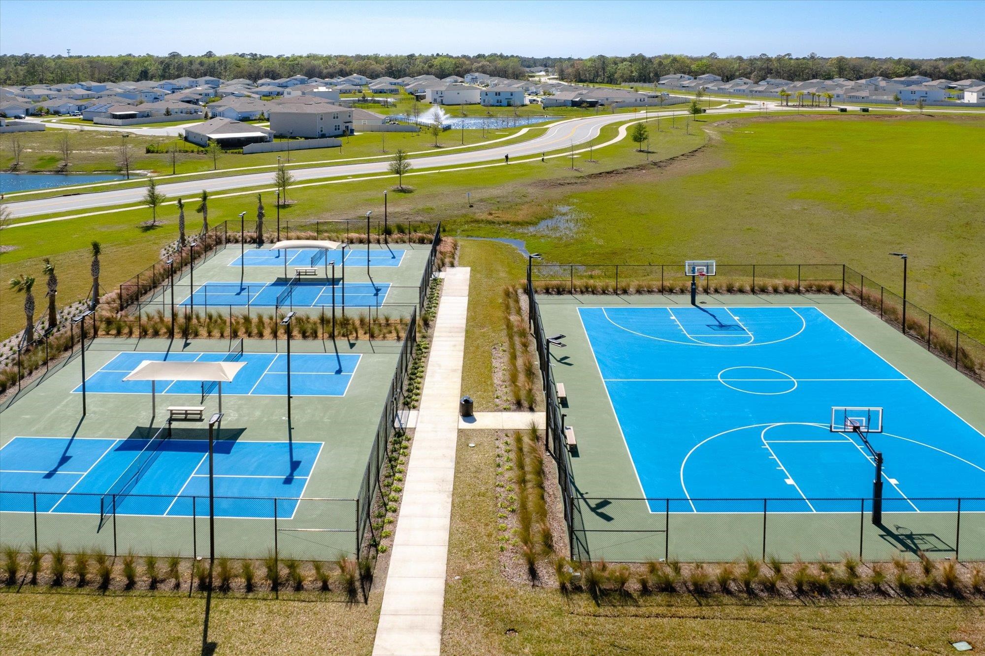23 Alagon Way Street St. Augustine, FL 32084 - Photo 48 of 51 a view of a swimming pool with a lake