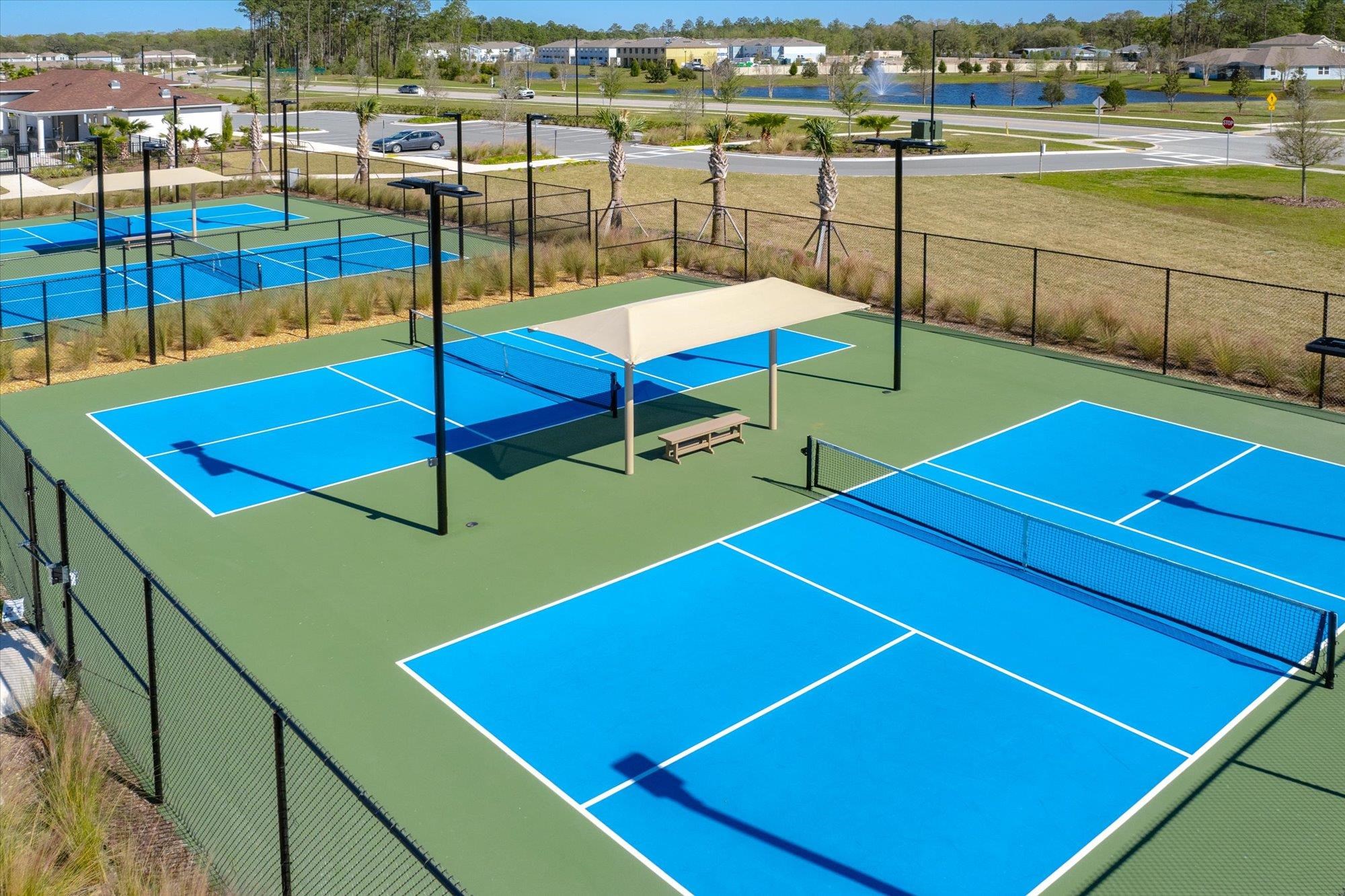 23 Alagon Way Street St. Augustine, FL 32084 - Photo 49 of 51 a view of a tennis court with seating area