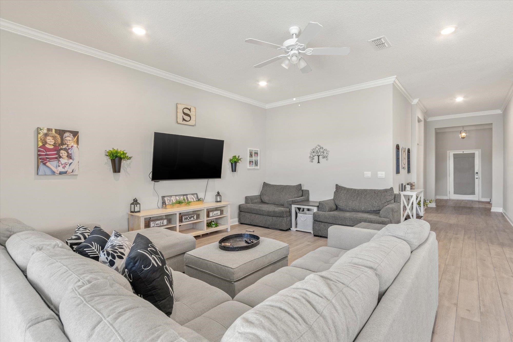 23 Alagon Way Street St. Augustine, FL 32084 - Photo 5 of 51 a living room with furniture and a flat screen tv
