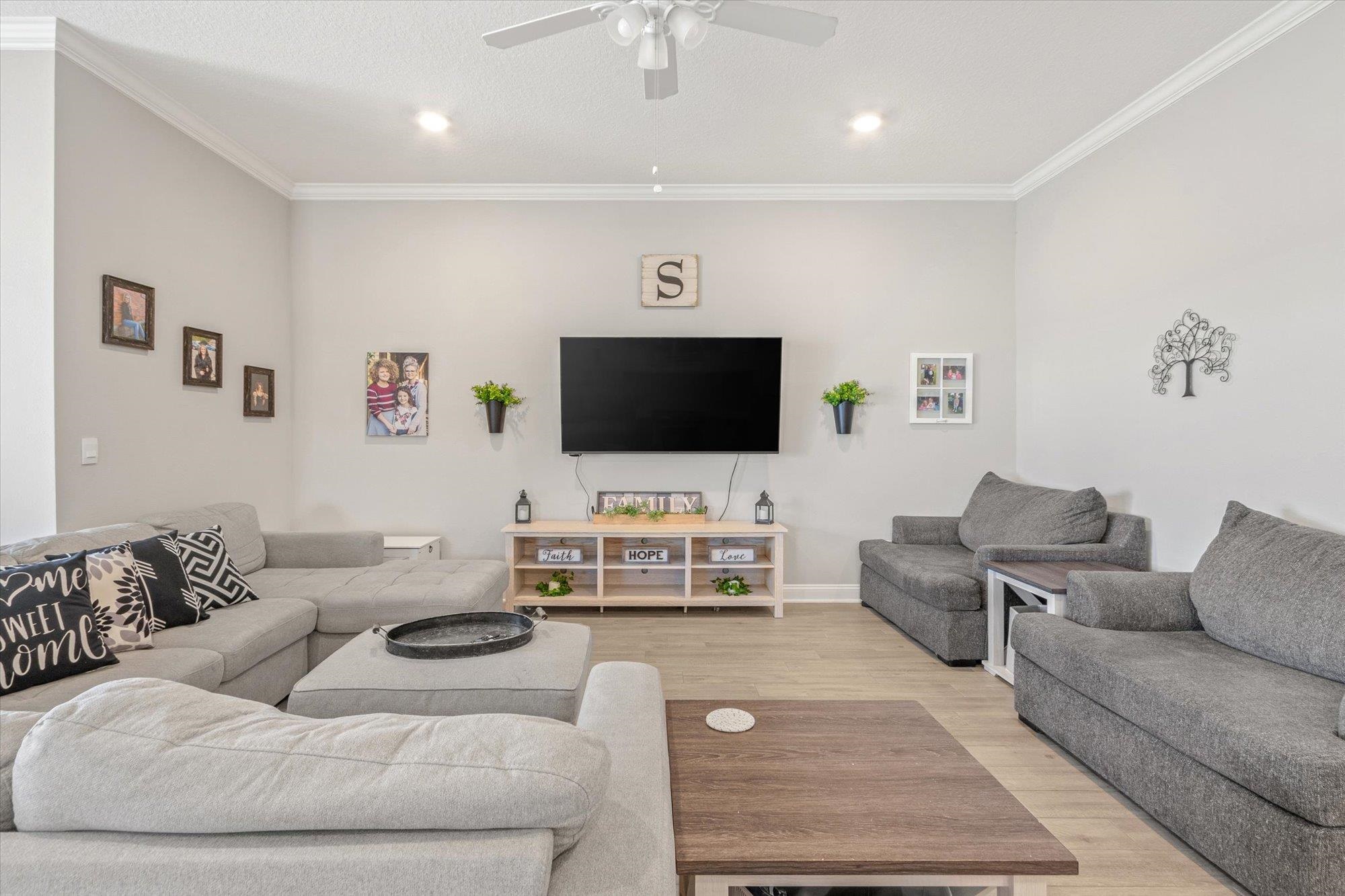 23 Alagon Way Street St. Augustine, FL 32084 - Photo 6 of 51 a living room with furniture and a flat screen tv
