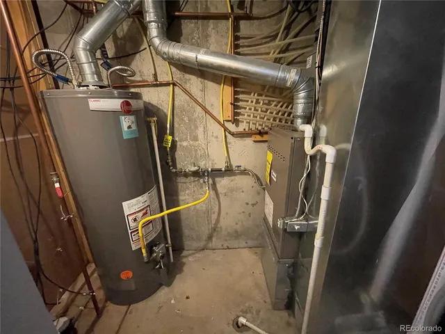 a bedroom with a bed and furniture