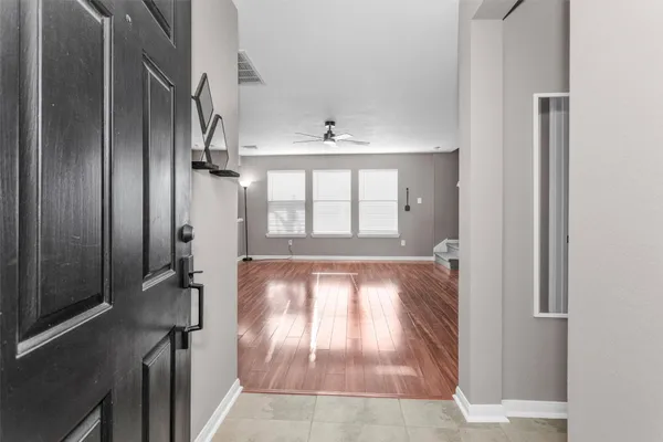 a view of entryway with wooden floor