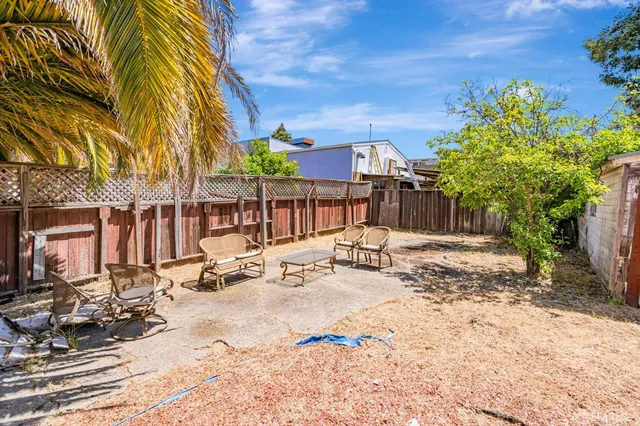 a view of a building with a yard