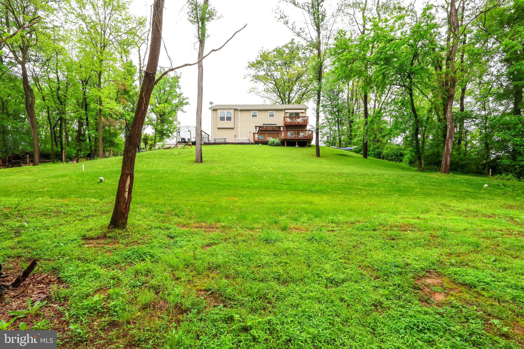 16919 Shaffer Road Sharpsburg, MD 21782 - Photo 51 of 58 a view of a house with backyard and a tree