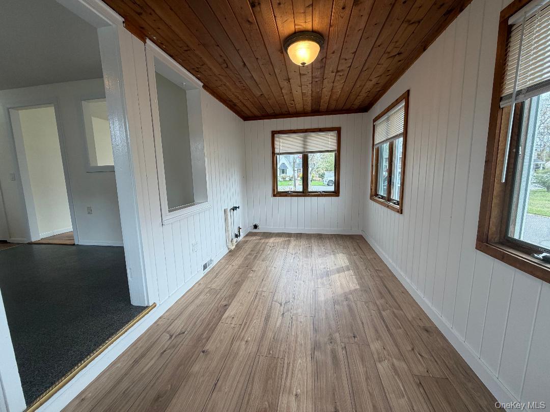 17 Eastover Road Sayville, NY 11782 - Photo 8 of 19 Enclosed Porch with Laundry Hook-Up