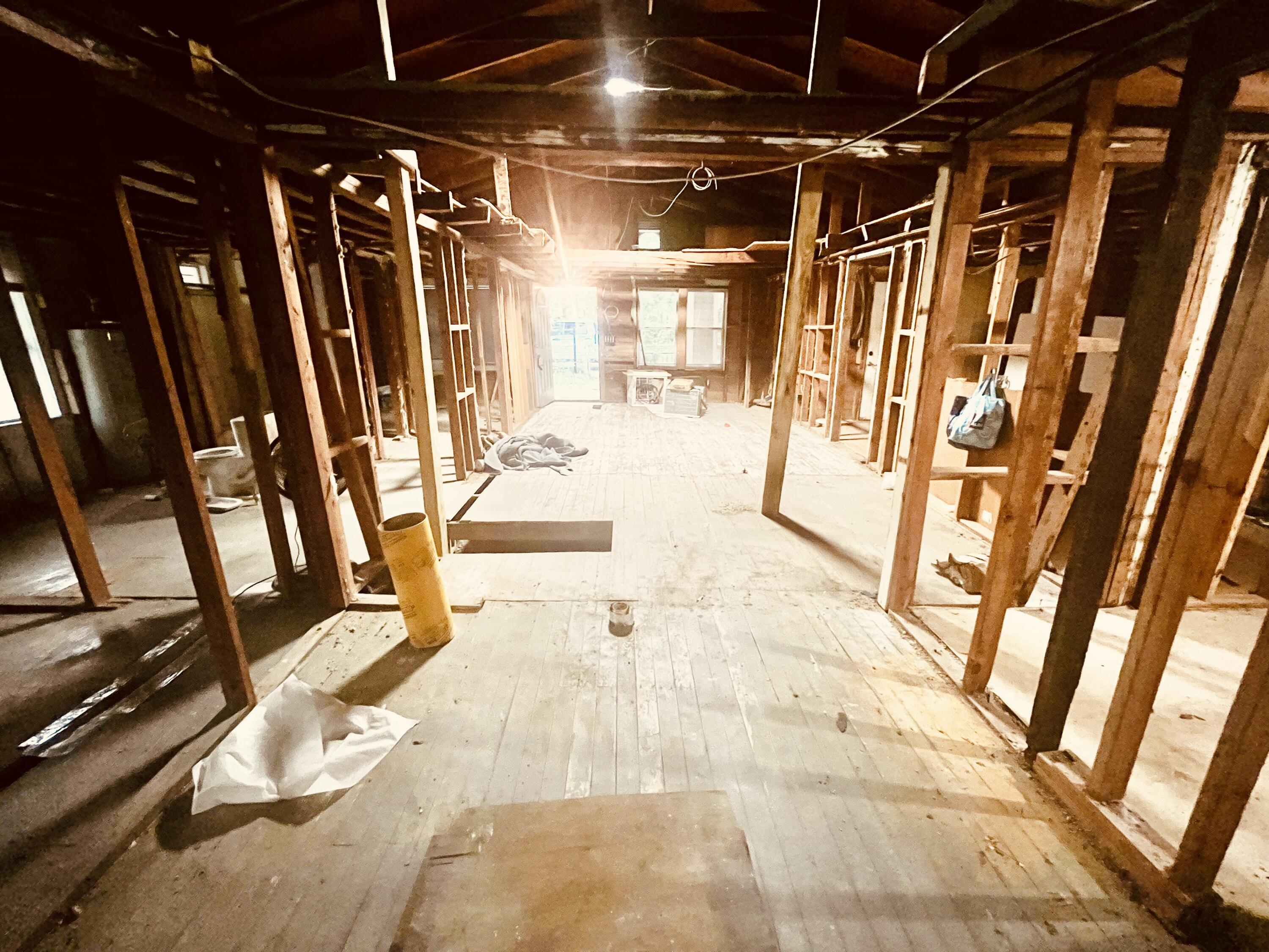 3040 Register Lane Crestview, FL 32539 - Photo 12 of 13 a view of an empty room with wooden floor