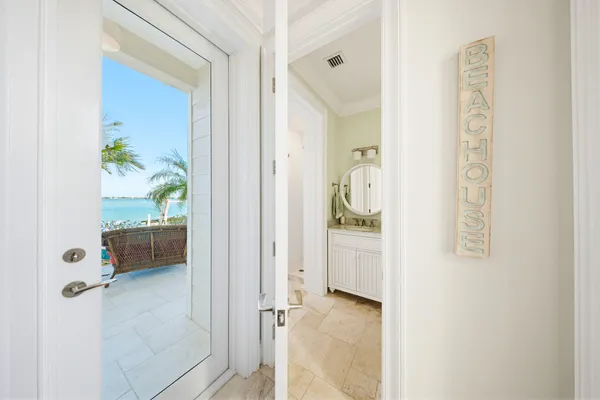 a spacious bathroom with a sink a mirror a vanity and shower
