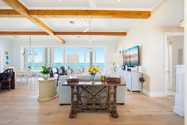 a kitchen with stainless steel appliances white cabinets and stove
