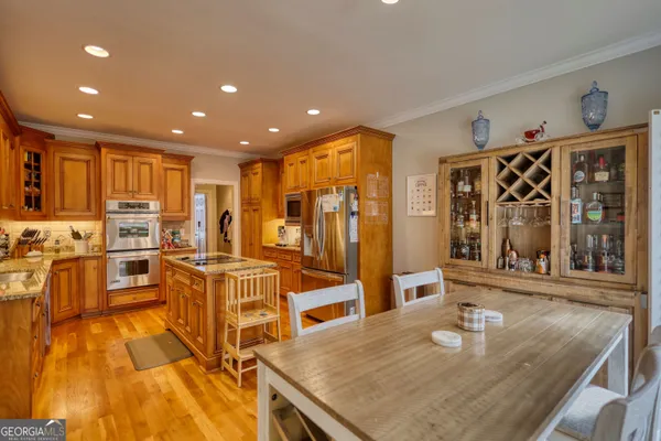 a living room with furniture and large window