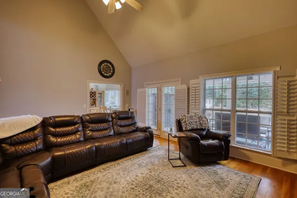 a living room with furniture and a couch