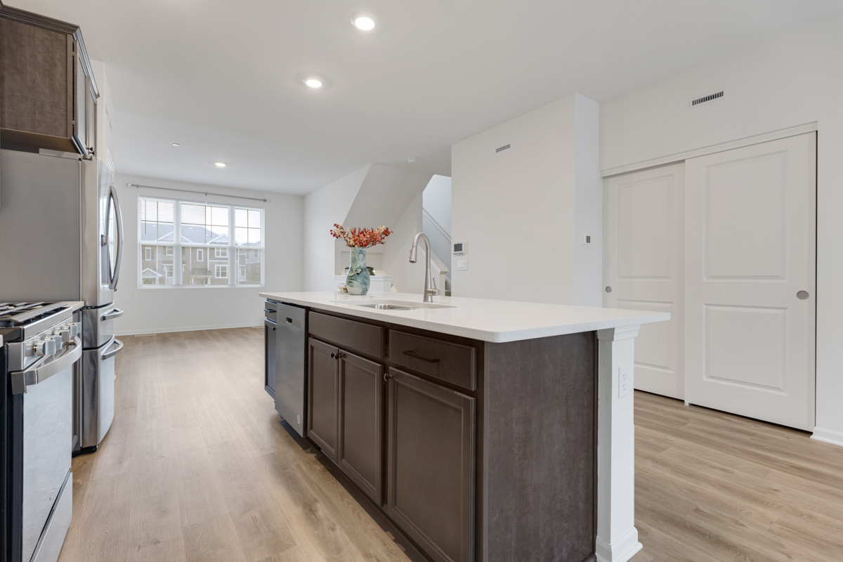 2016 Yellowstone Boulevard Mundelein, IL 60060 - Photo 11 of 26 a kitchen with kitchen island a sink appliances and cabinets
