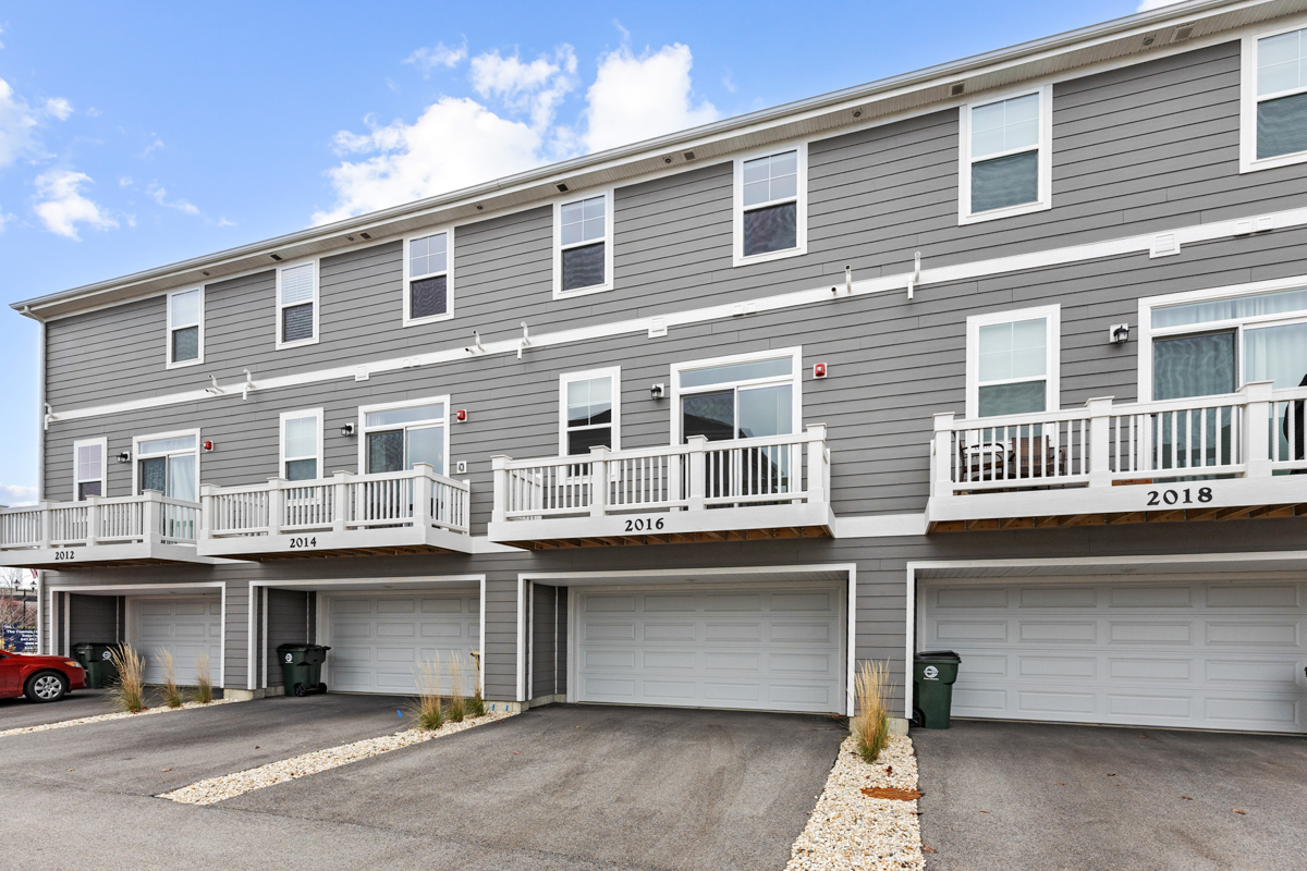 2016 Yellowstone Boulevard Mundelein, IL 60060 - Photo 24 of 26 a front view of a building with a lot of windows
