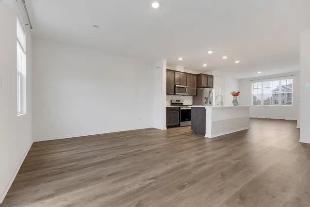 a view of kitchen with wooden floor