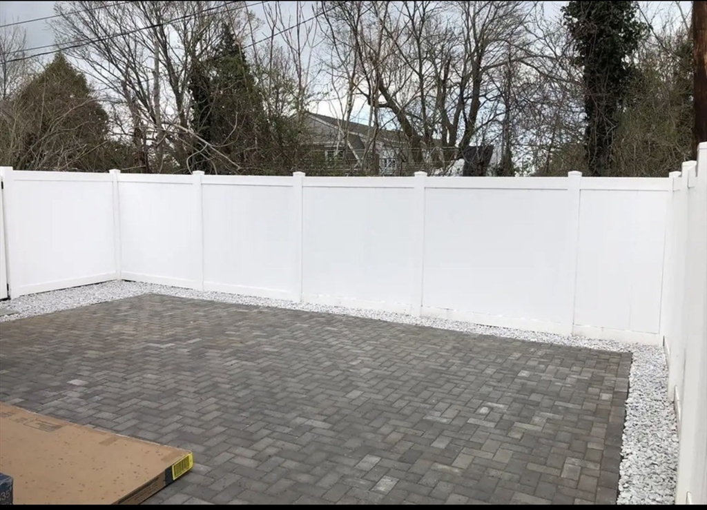 65 Louis Street, Unit A Barnstable, MA 02601 - Photo 9 of 15 view of outdoor space and yard