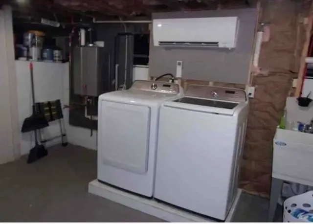 a utility room with dryer and washer