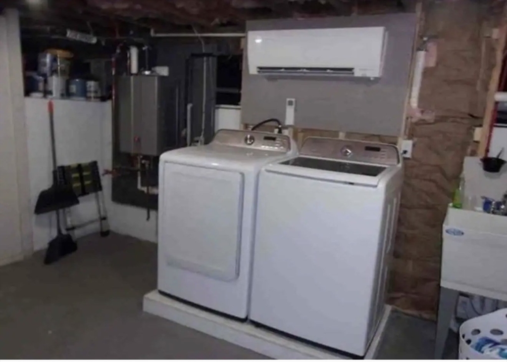 65 Louis Street, Unit A Barnstable, MA 02601 - Photo 10 of 15 a utility room with dryer and washer