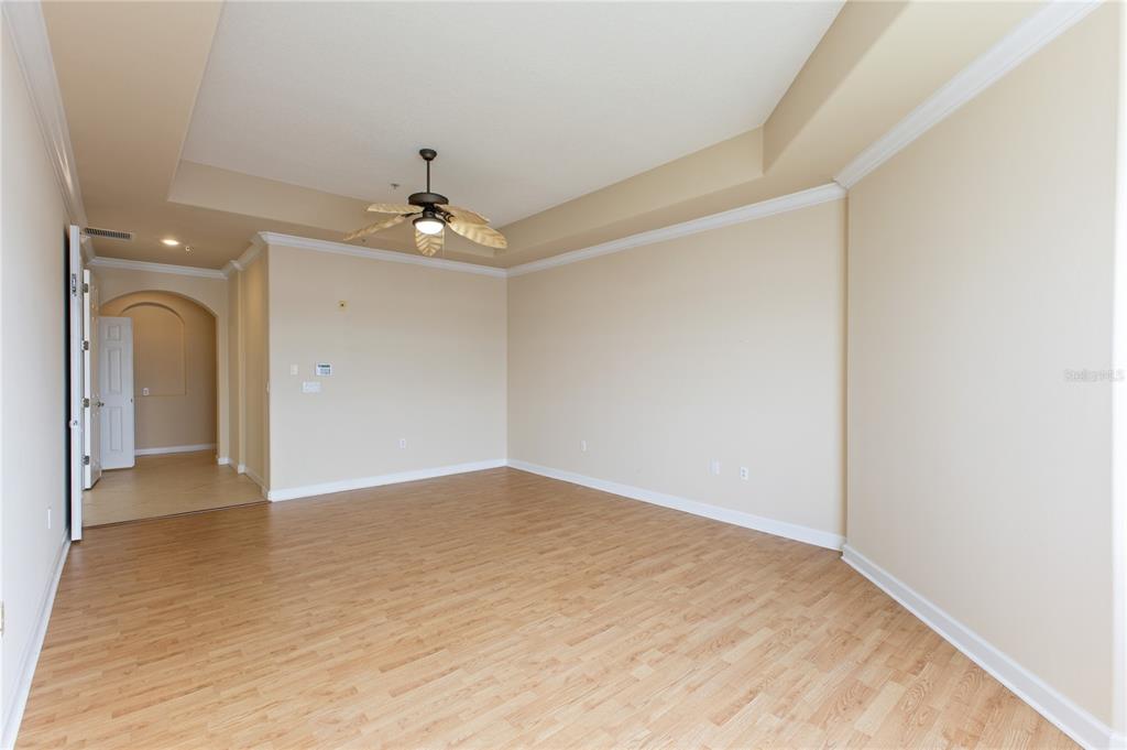 8755 The Esplanade, Unit 126 Orlando, FL 32836 - Photo 25 of 30 wooden floor in an empty room