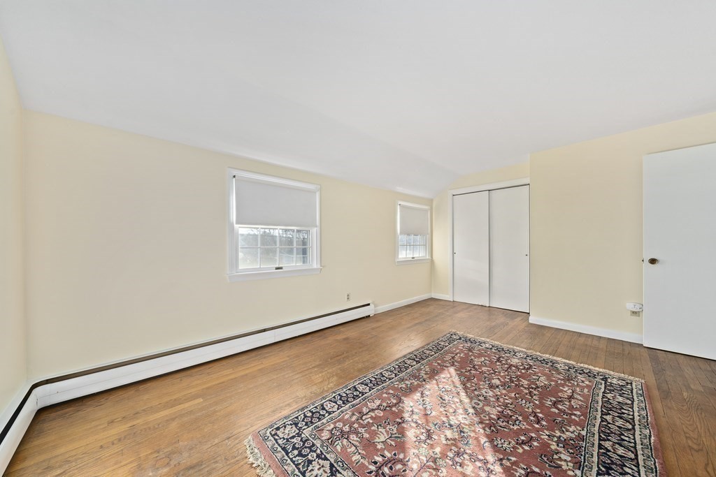 57 Norfolk Road Braintree, MA 02184 - Photo 15 of 30 an empty room with a workspace