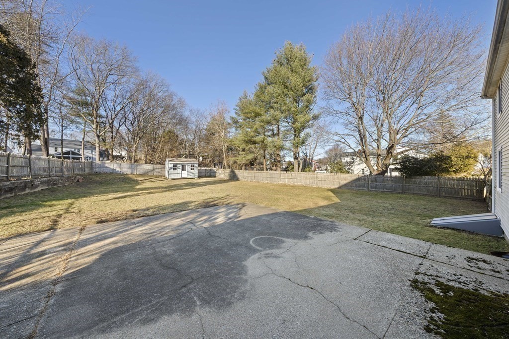 57 Norfolk Road Braintree, MA 02184 - Photo 20 of 30 a view of yard with tree s