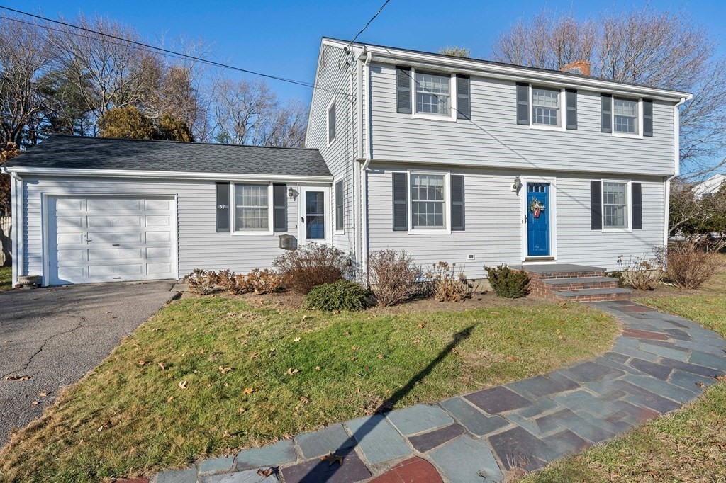 57 Norfolk Road Braintree, MA 02184 - Photo 2 of 30 front view of house with a yard
