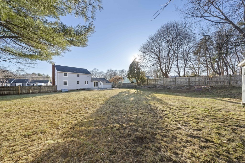 57 Norfolk Road Braintree, MA 02184 - Photo 22 of 30 a view of swimming pool with a yard