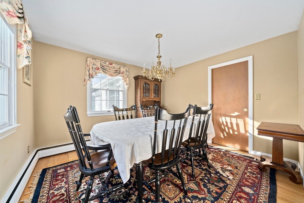57 Norfolk Road Braintree, MA 02184 - Photo 5 of 30 a view of a dining room with furniture window and wooden floor