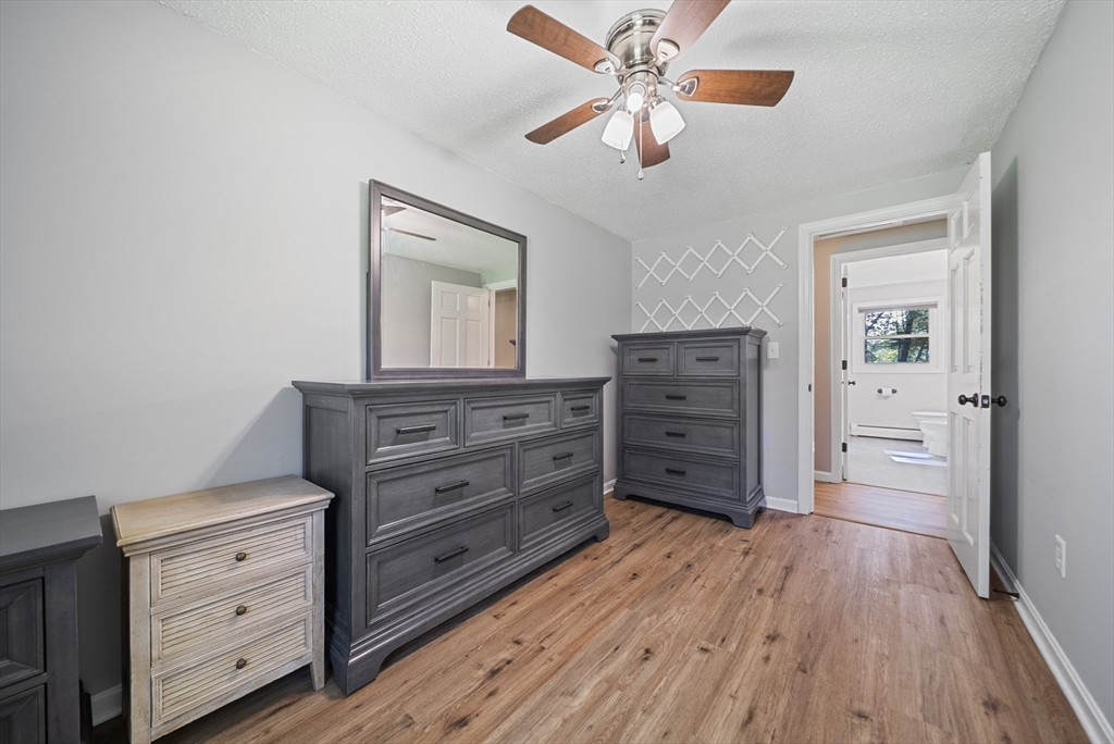 21 Woodman Road Amesbury, MA 01913 - Photo 14 of 30 a view of room with cabinet and flat screen tv