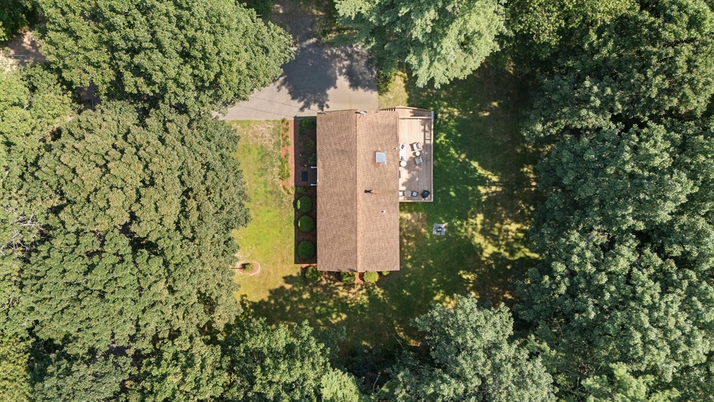 21 Woodman Road Amesbury, MA 01913 - Photo 25 of 30 an aerial view of a house with a yard